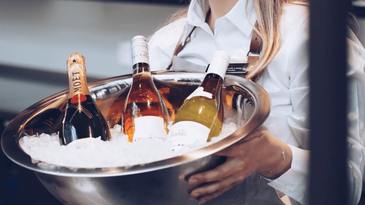 Wine and bubbles in a ice bucket at restaurant The Social Bar & Bistro.