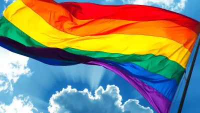 Pride flag waving in the sky