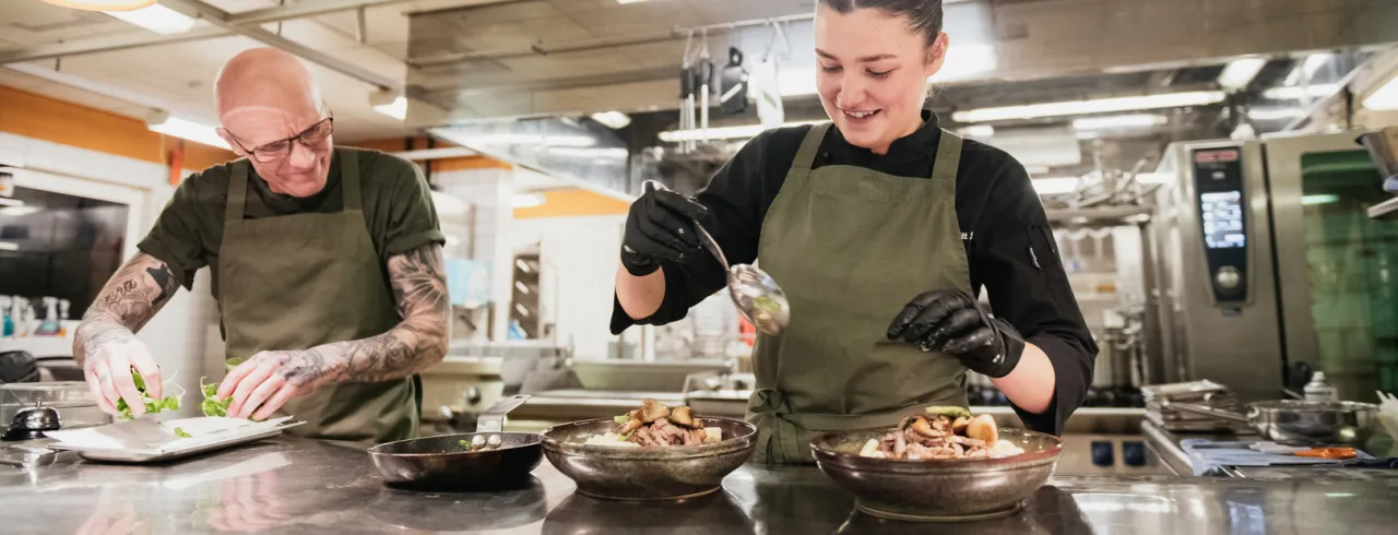 Chefs making food at Flying Restaurant & Pub