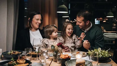 A family having dinner at Quality Hotel™.