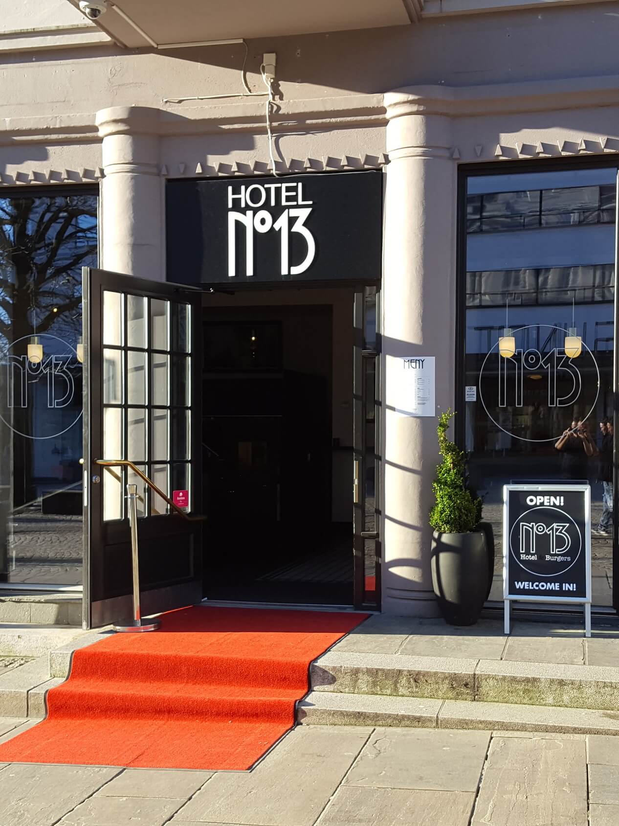 The entrance in sunlight at Hotel NO 13 in Bergen.