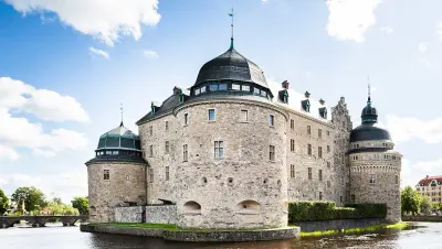 Orebro Castle surrounded by water in summer