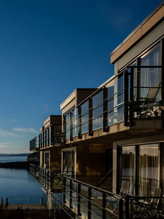 Son Spa facade and the sea in sunlight.
