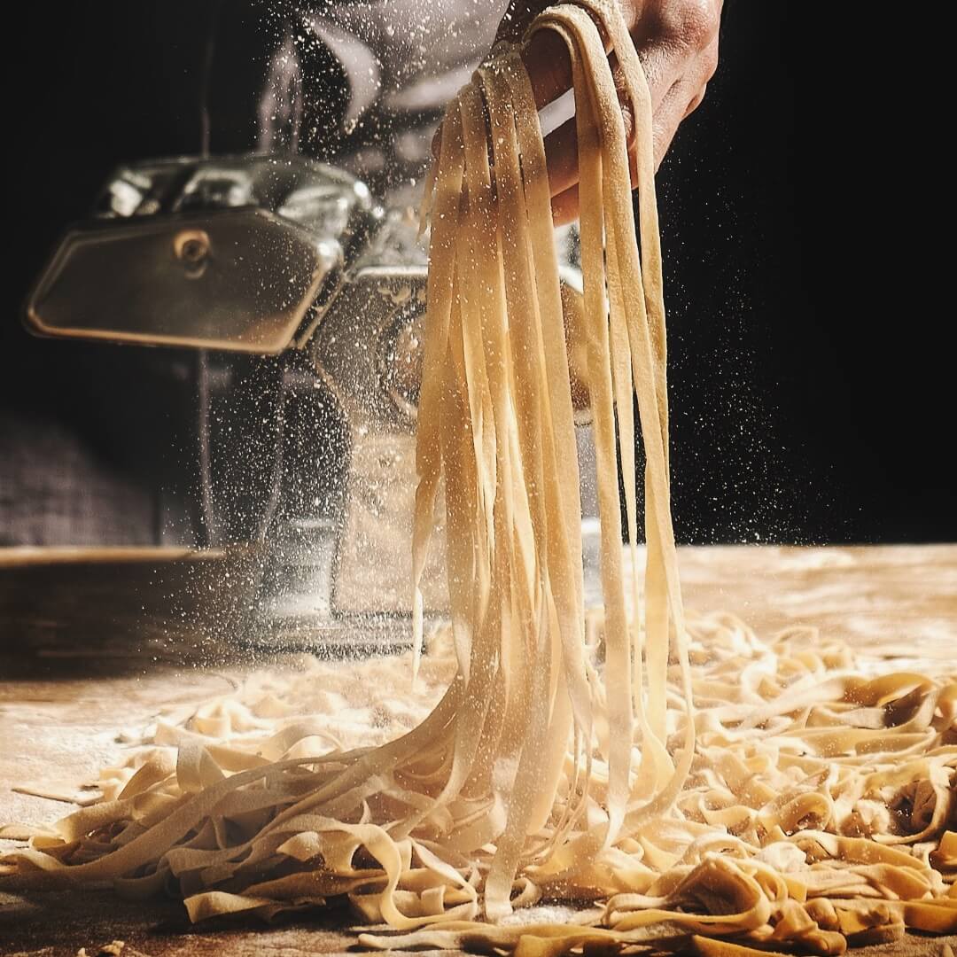 Making pasta in the kitchen at Grand Italian, Malmö.