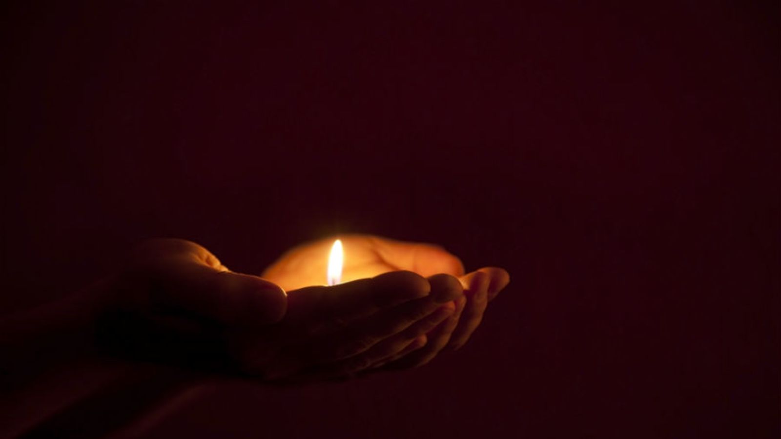 candle-light-hands-istock.jpg