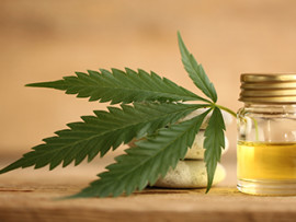CBD-oil-and-cannabis-leaf
