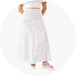 Woman Wearing White Soft Dtsy Tiered Maxi S