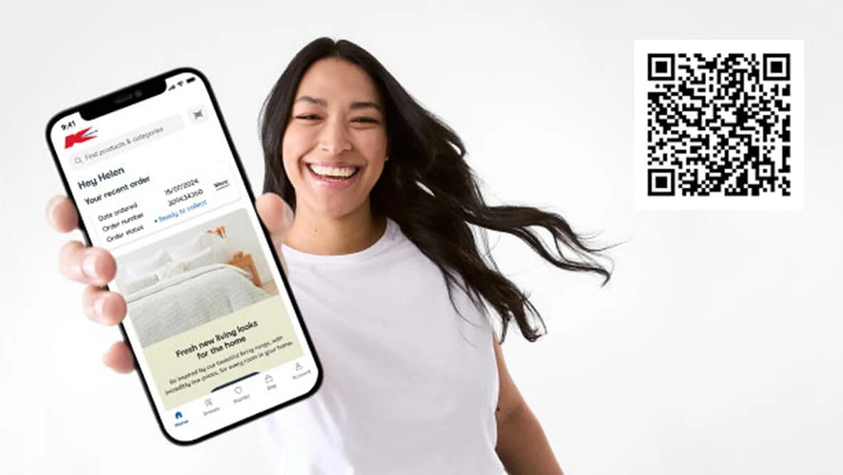 Talent showing KMART app on her phone