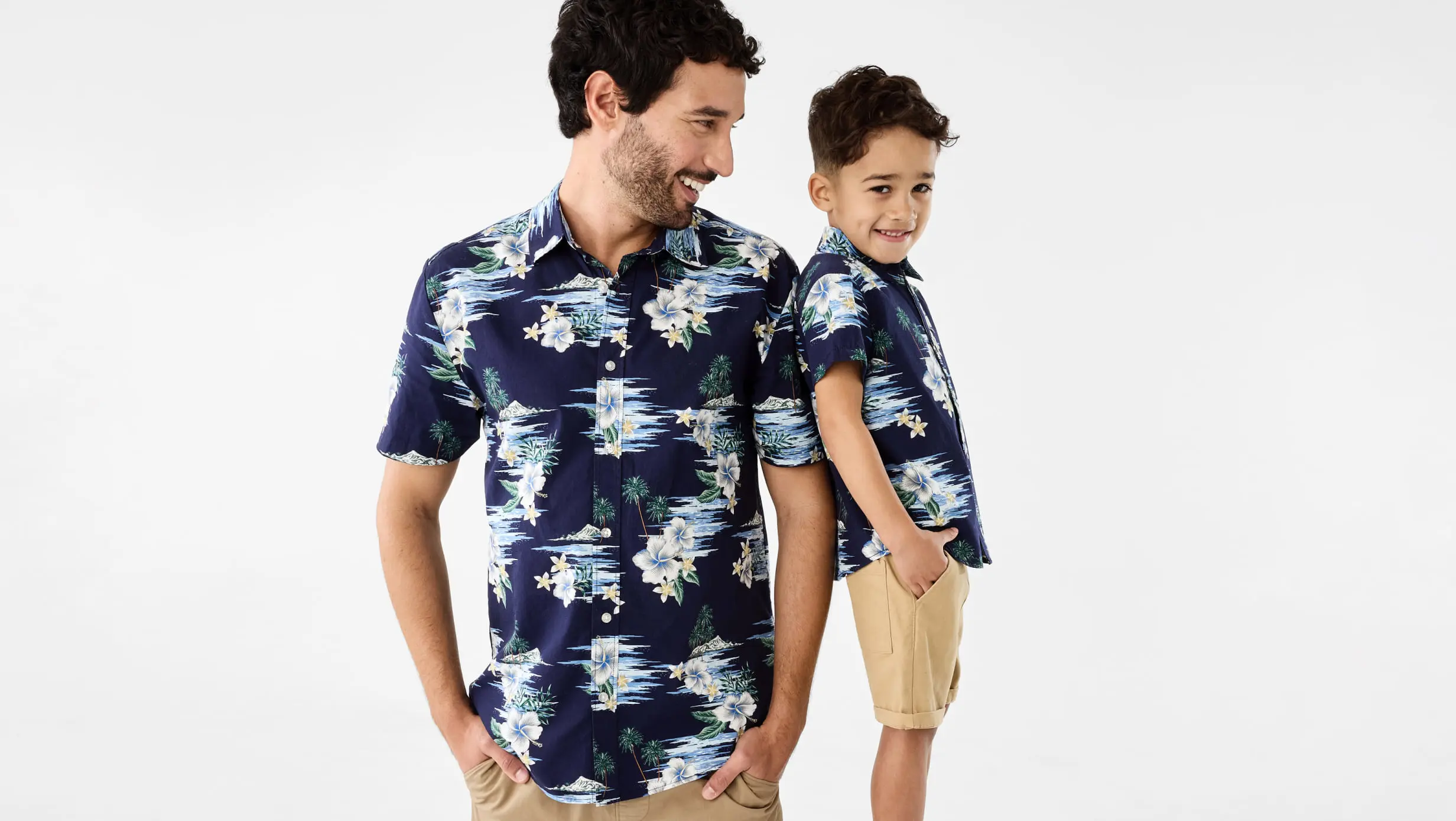 Father and son duo wearing matching Short Sleeve Poplin Print Shirts