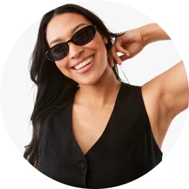 Woman Wearing Oval Shape Sunglasses in Black Co