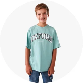 Young Boy Wearing Teal Colour Oversized Graphic T-s