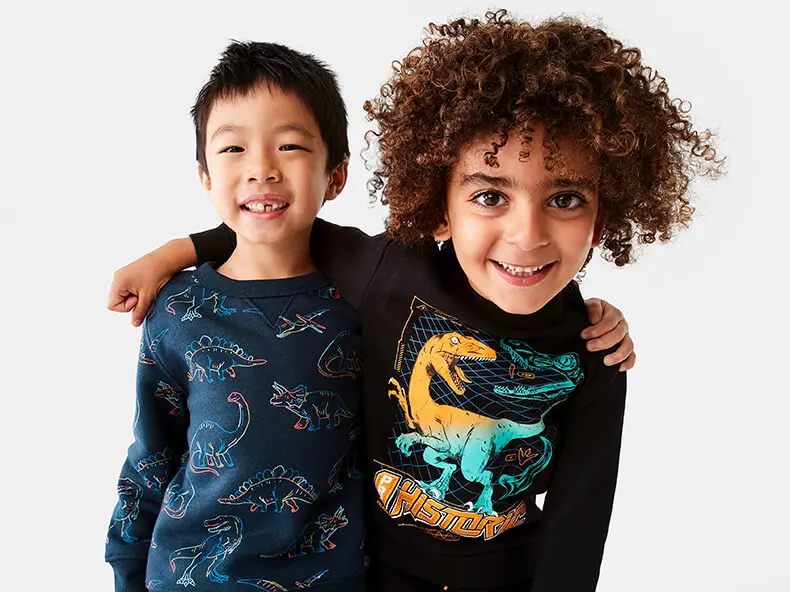 two boys wearing mix and match sweatsh