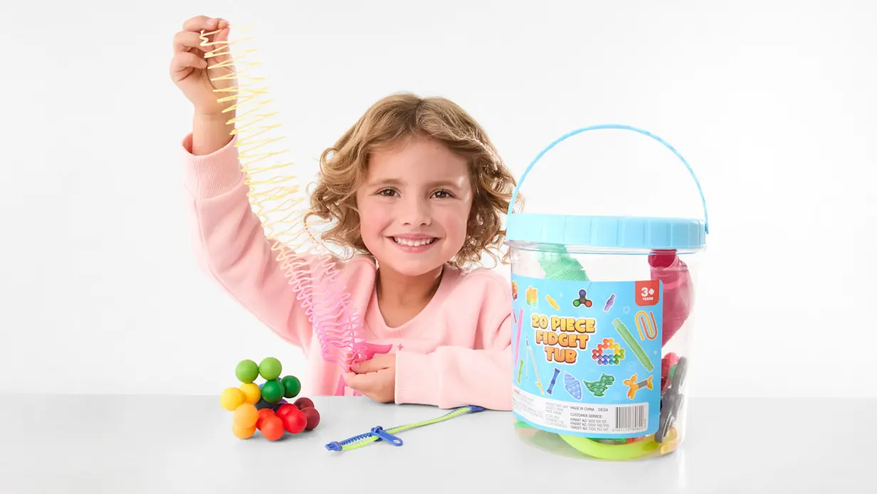 Young kid playing with the 20 Piece Fidget Tub