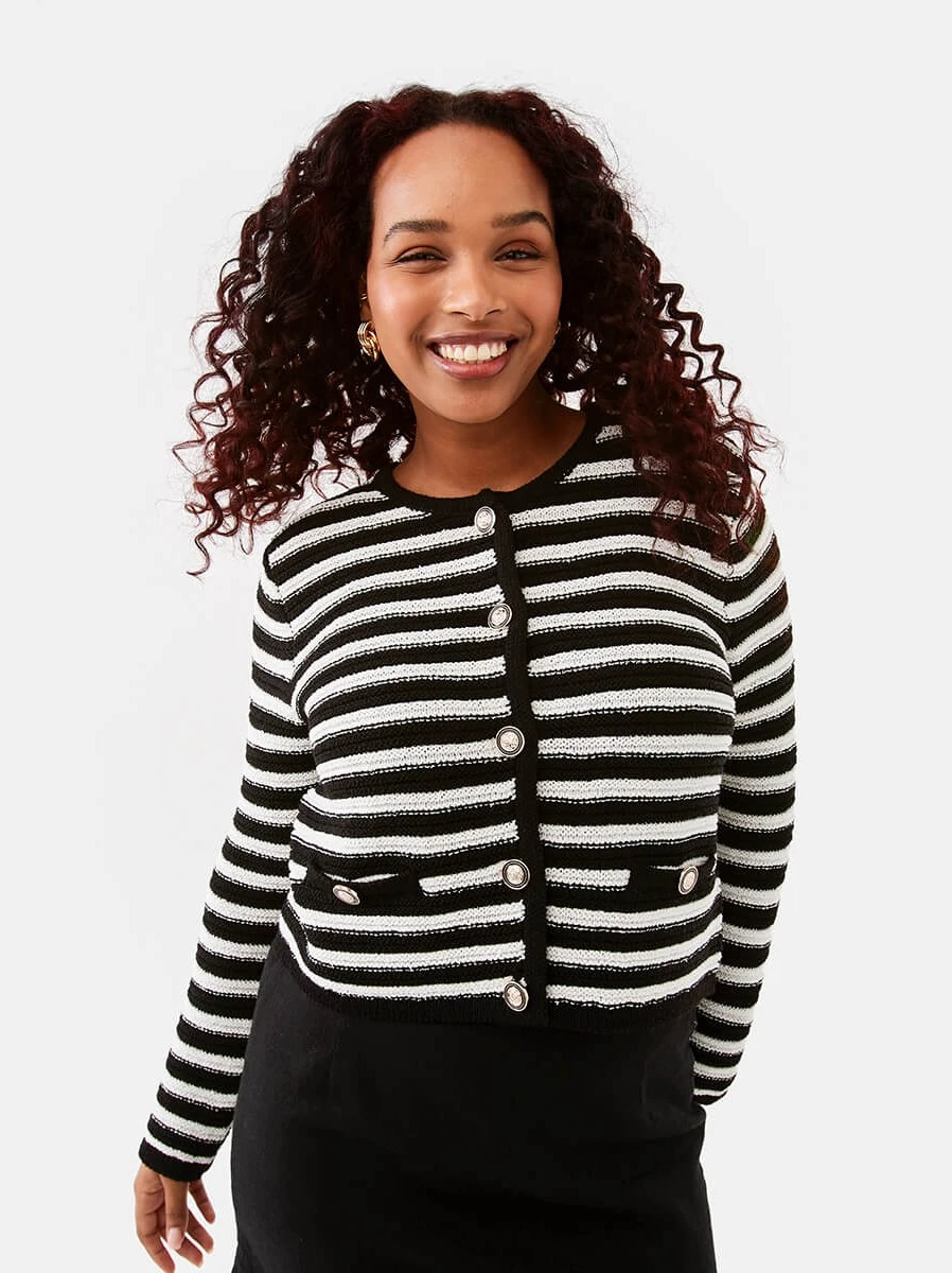 Woman wearing black striped cardigan