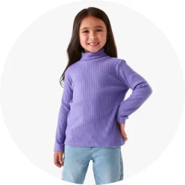 kid wearing a purple long sleeve