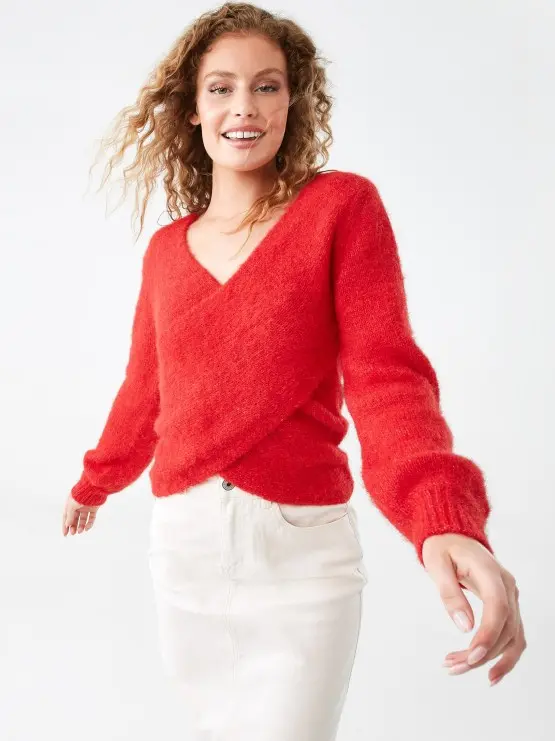 woman wearing a red crossover wrap ju