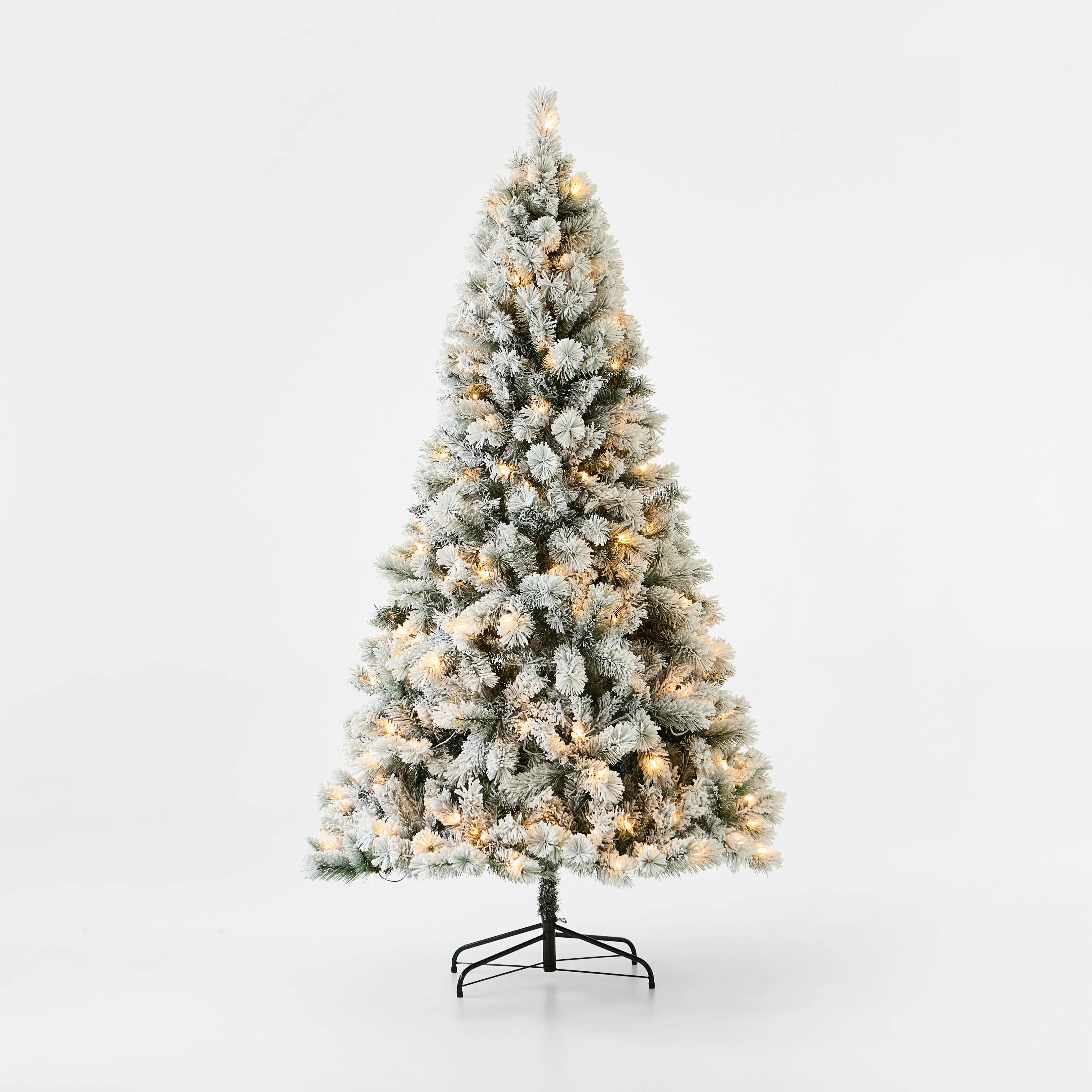 2.13m (7ft) Snowy Prelit Christmas Tree with the lights turned on