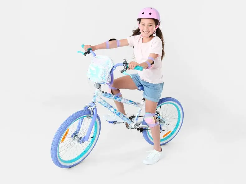 Girl riding on 50 cm sparkle blue 