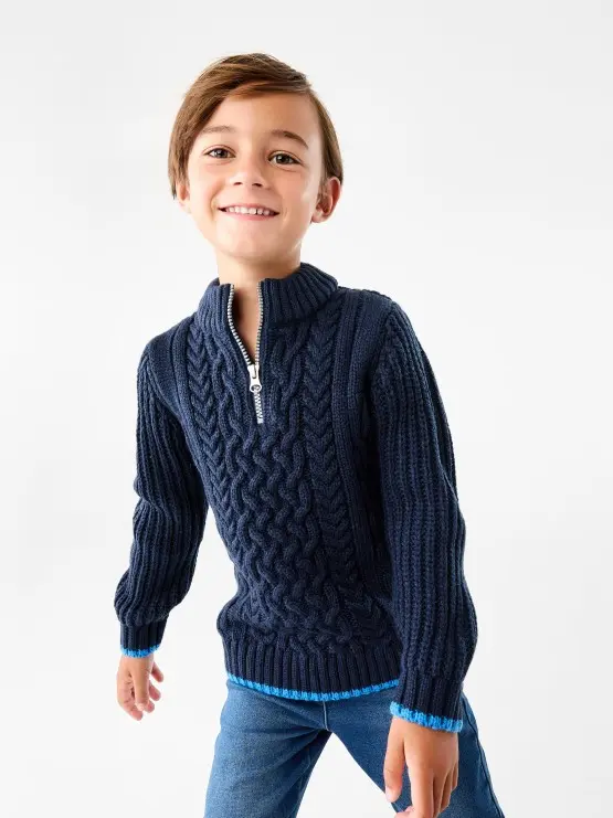 young boy wearing a navy Cable Quarter Zip Knit