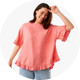 Woman Wearing Short Sleeve Button Back Relaxed Peach Color T-s