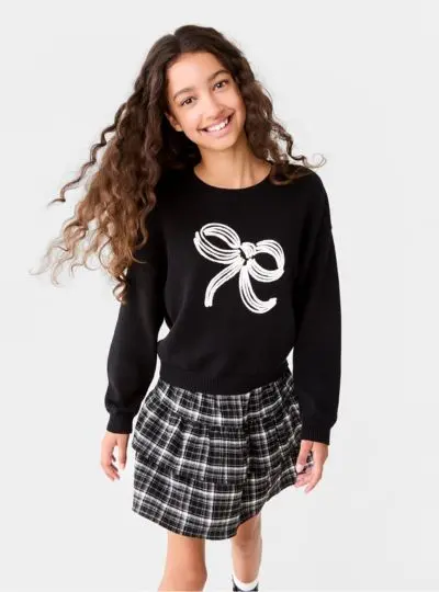 Girls black bow jumper and skirt