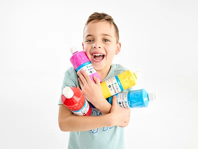 little boy with poster paint supplies