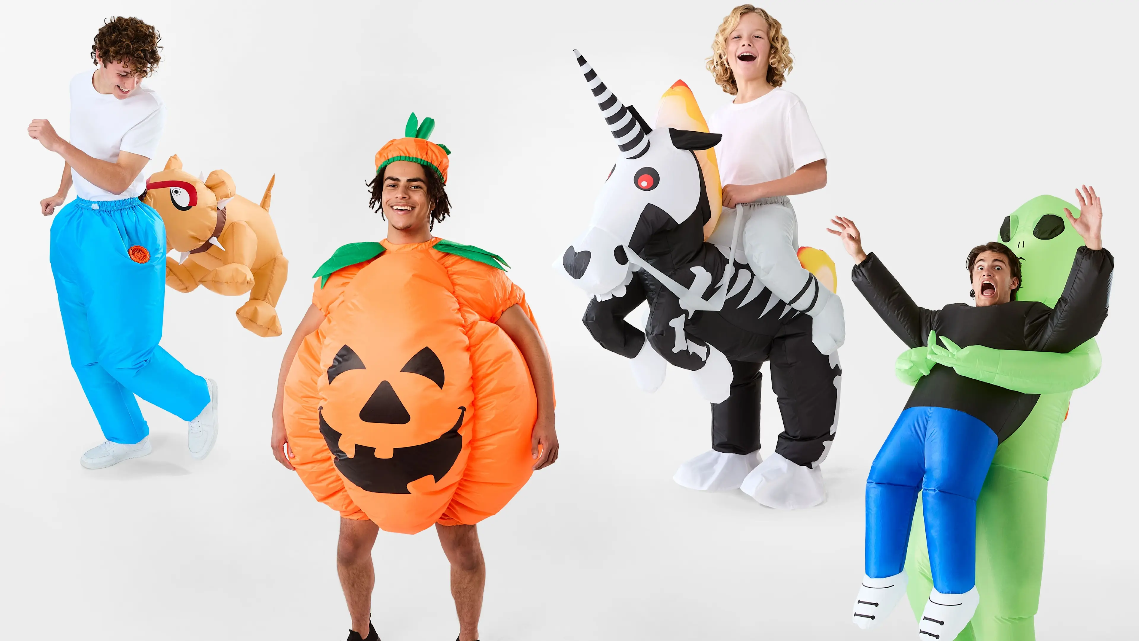 A group of people wearing inflatable style halloween costumes