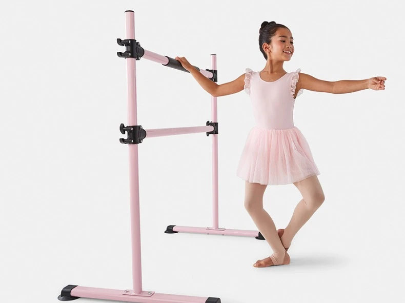 Girl practicing her ballet moves with pink colored Ballet B