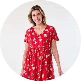 a woman wearing red christmas d