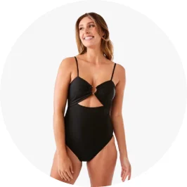 Woman wearing black cut out one piece swim