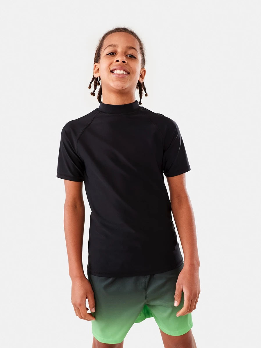 Teenage Boy Wearing Black Short Sleeve Basic Rash Vest and Printed Sh