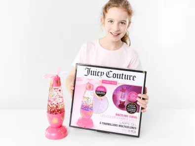 Girl Playing with Dazzling Swirl LED Color Change Light