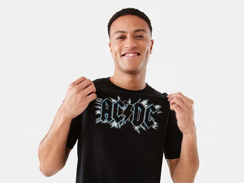 Adult male wearing ACDC T-shirt