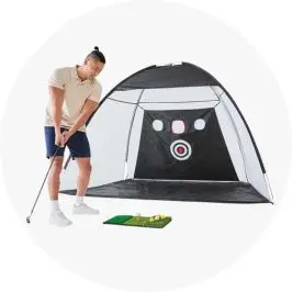 Male talent playing with golf net 