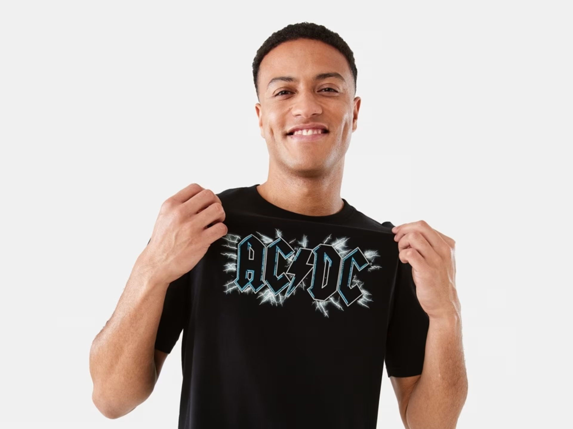 Male posing with ACDC T-shirt