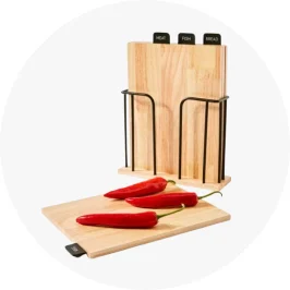 kitchen cutting boards with peppers sitting on