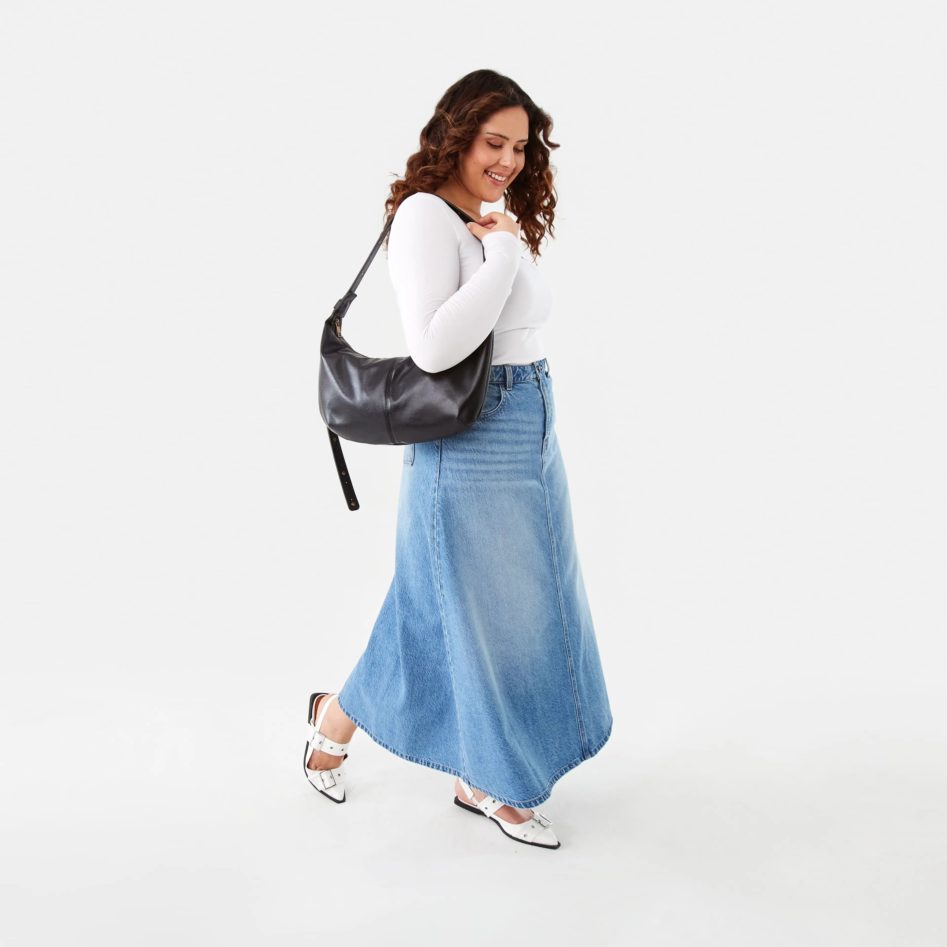 Woman Wearing Denim A Line Skirt with White Top