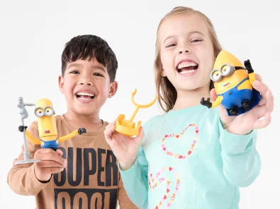 kids playing with minion toys