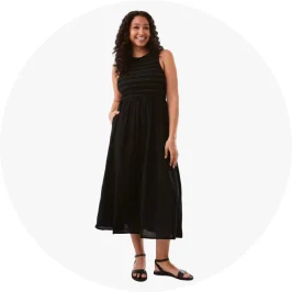 Woman Wearing Black Sleeveless Shirred Bodice Midi D