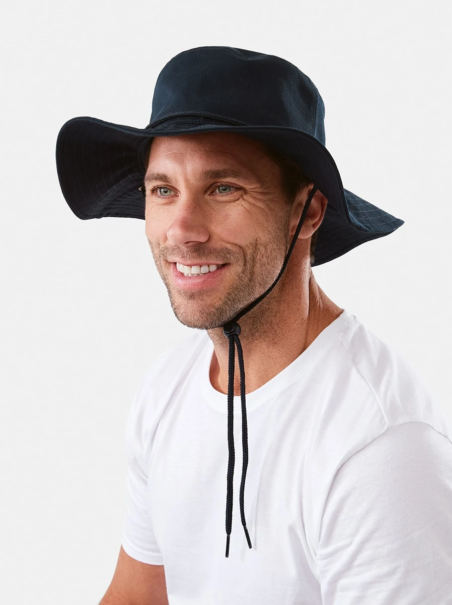 Talent wearing Navy Wide Brim Fisherman