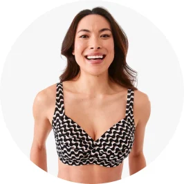 Woman Wearing Twist Front Bikini Top in Black Wave P