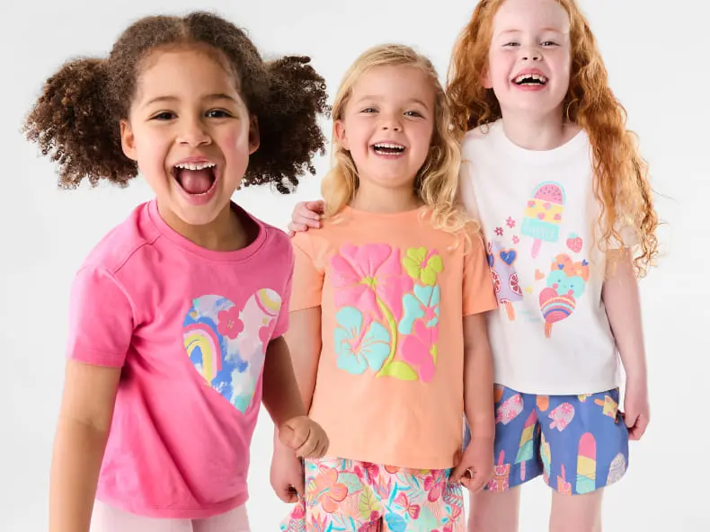 Three little girl talente wearing different styled Spring Summer coloured tops