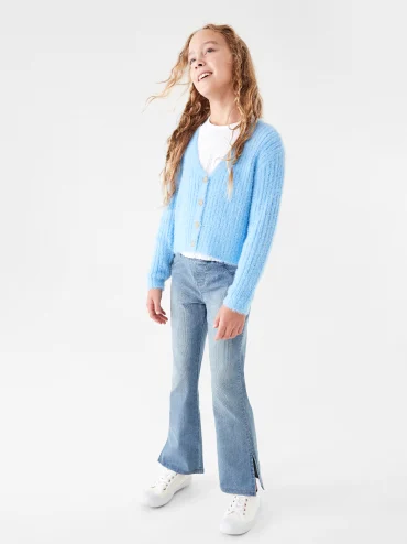 girl wearing a light blue knitted