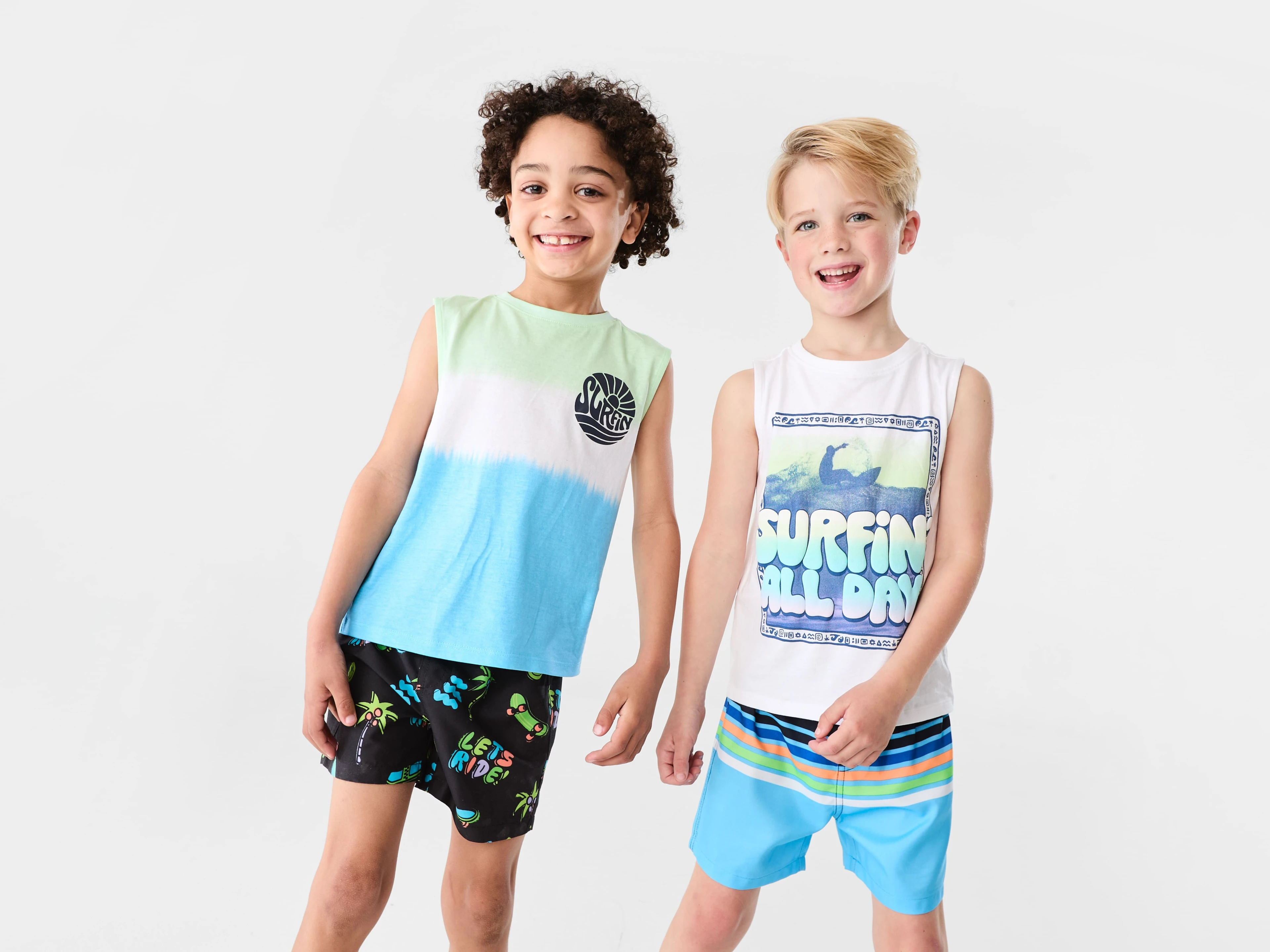 Two Young Boys Wearing Tie Dye Print Surf Shirts and Swim Shorts