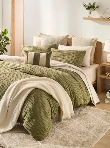 new green bedding set and cush