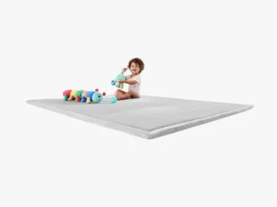 Toddler on a Soft Play Mat- Grey.jpg