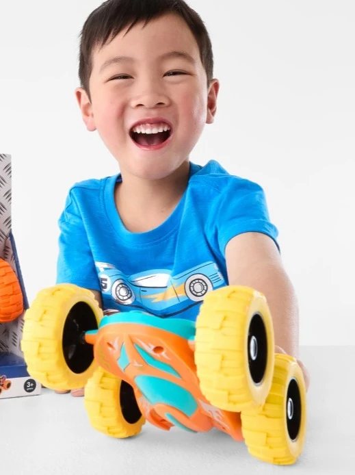 Young boy with flipping car