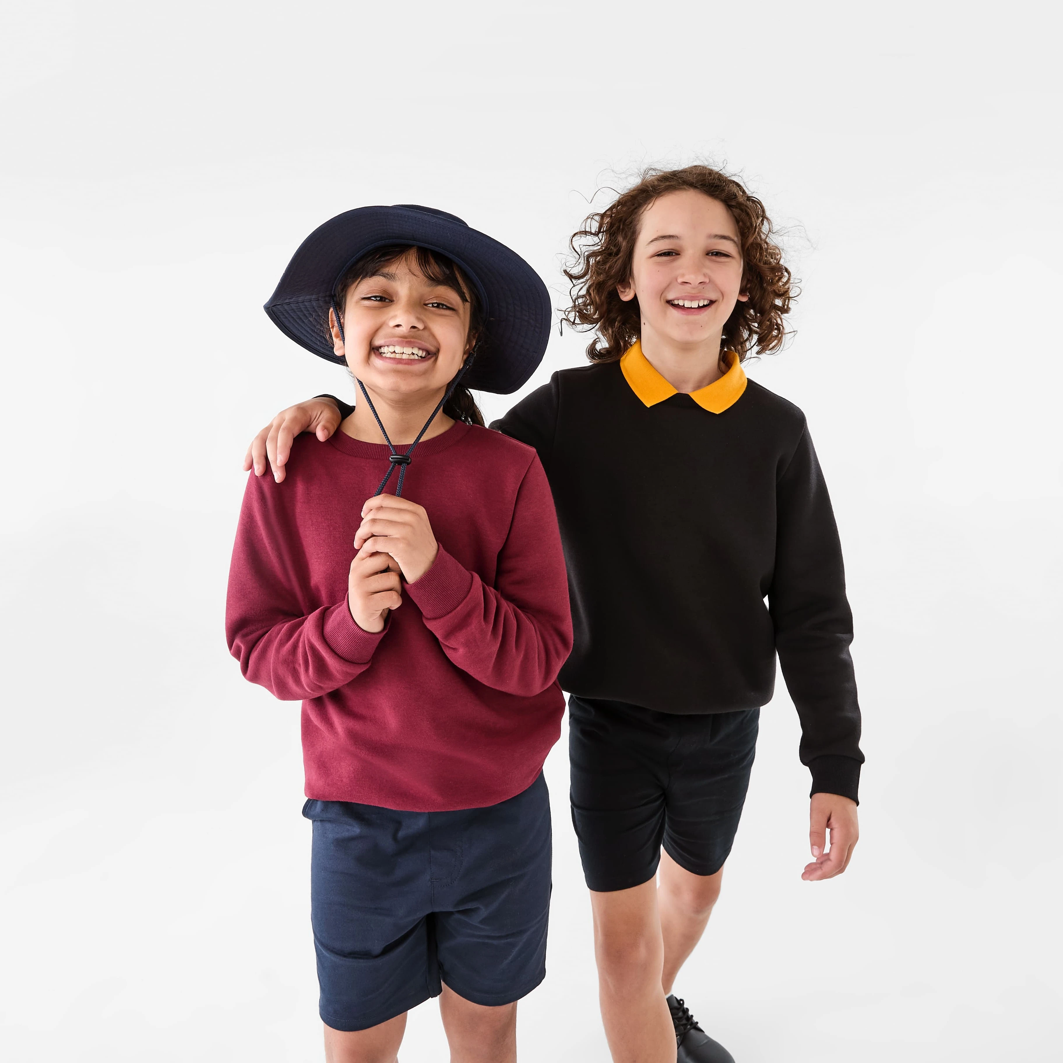 Students in school shorts and school jumpers