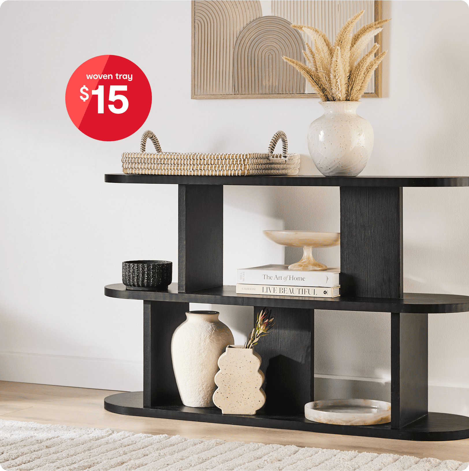 Living room bookshelf set-up with an assortment of home decor items