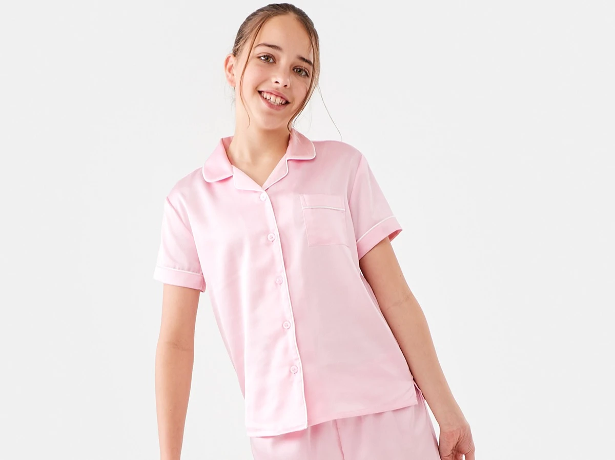 Girl Wearing Pearl Pink Short Sleeve Top and Shorts Satin Pyjama